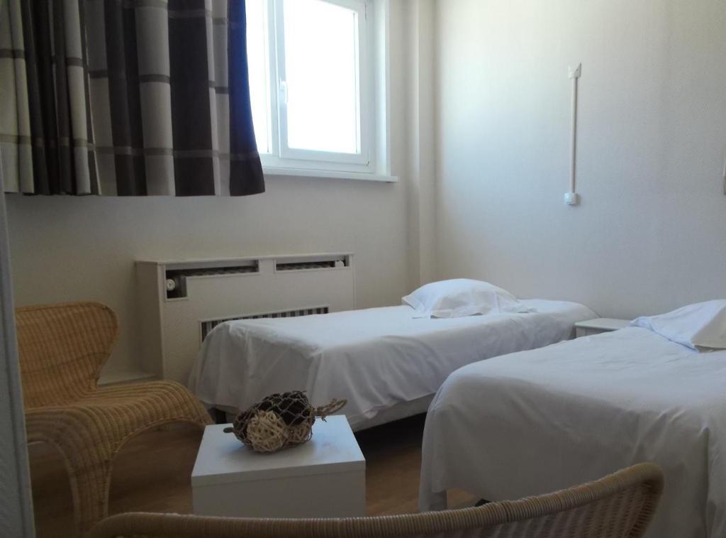 Hotel Pacific กาเลส์ ห้อง รูปภาพ